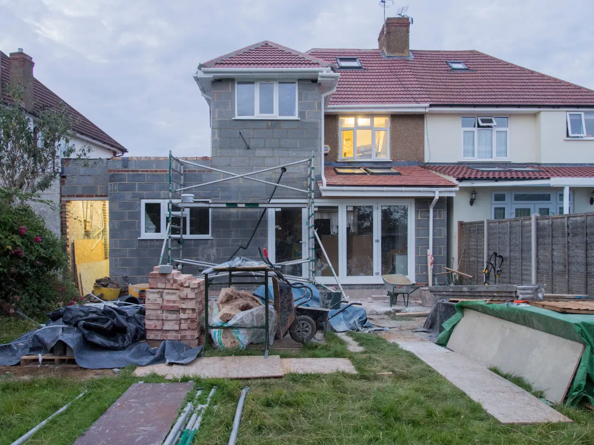 London terraced houses with building work under way