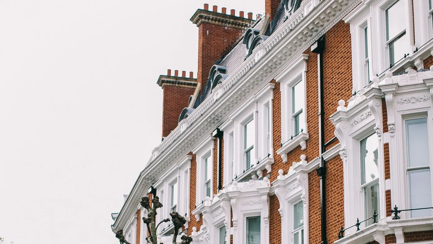 Victorian terraced houses with chimney stacks along the roofline
