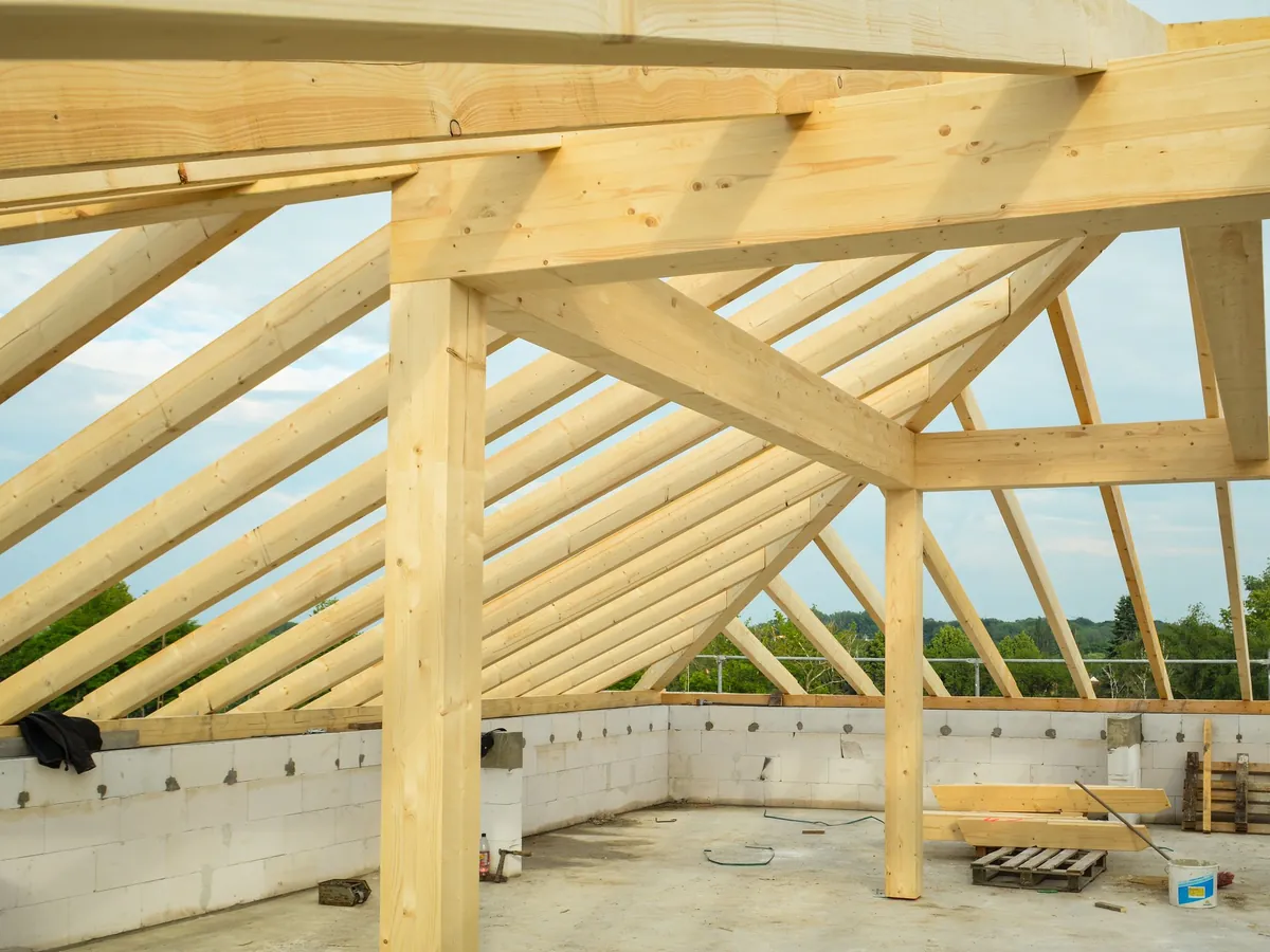 Timber roof joists going up on a house extension