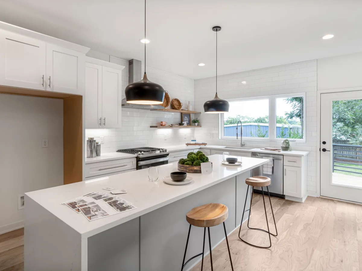 Bright finished kitchen with an island