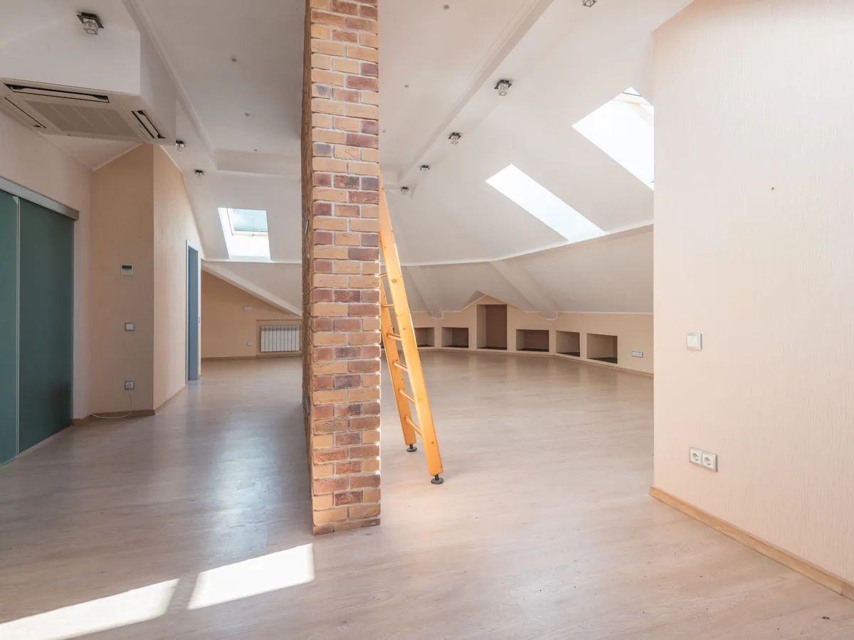 Loft room with roof windows and new plasterwork