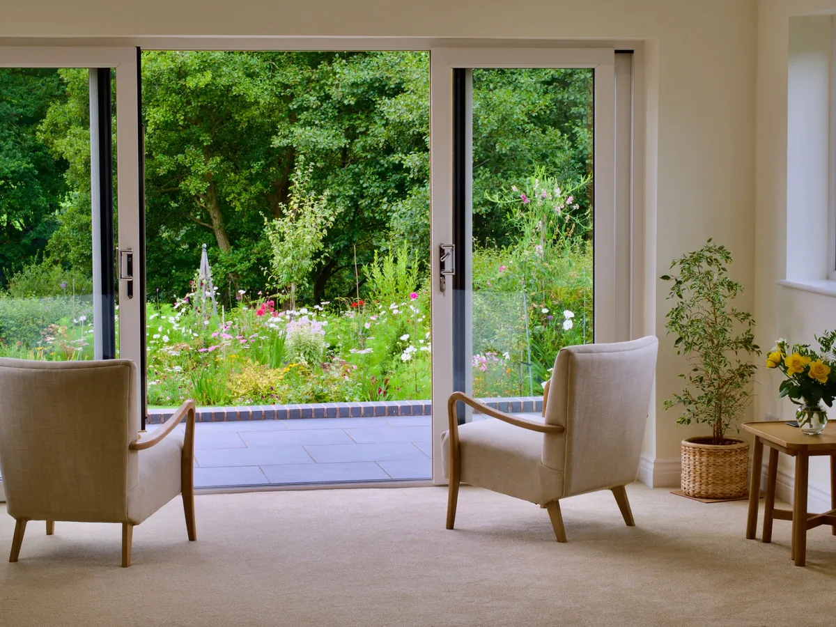Rear extension with glazed doors onto a garden